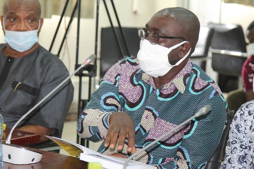 Mr George Sarpong answering questions before the Public Accounts Committee of Parliament  in Accra