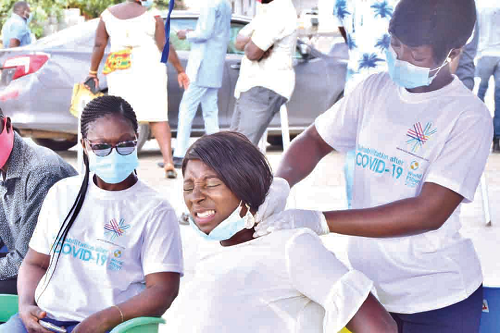 A physiotherapist massaging a patient 