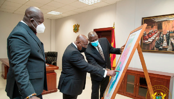 President Akufo-Addo (middle) in a discussion with Justice Anin Yeboah (right) and Mr Anthony Forson Jnr