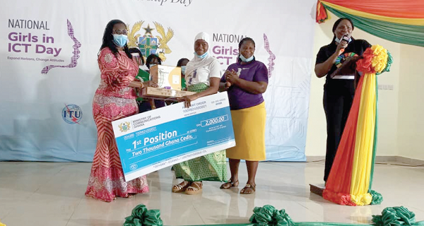 Mrs Ursula Owusu Ekuful (left), the Minister of Communications, presenting the award package to the overall winner, Miss Sadia Ali