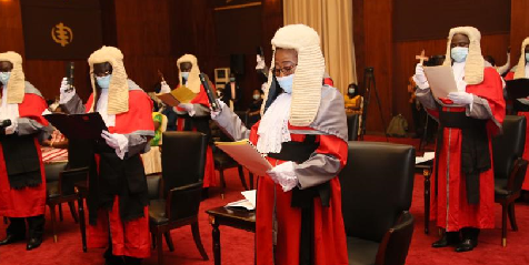Justices of the High Court judges swearing in the oath of Secrecy by President Nana Addo Dankwa Akufo-Addo..Pictures :Samuel Tei Adano