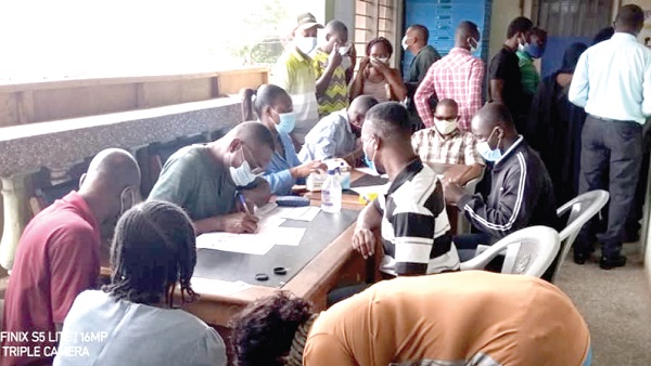 Some prospective registrants going through the registration process at the EC office at Ashaiman