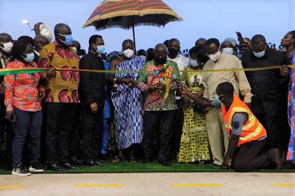 • President Akufo-Addo being supported by Otumfuo Osei Tutu II to cut the tape to commission the plant
