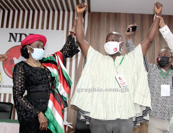 Nana Konadu Agyeman Rawlings (left), the flag bearer of the NDP, introducing Mr Peter Kwame Asamoah, the party’s  running mate, to the delegates in Accra