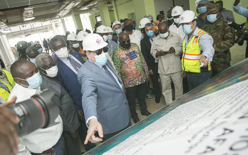 Dr. Said Deraz, the Chairman of Euroget explaining a point to President Akufo-Addo at the project site.