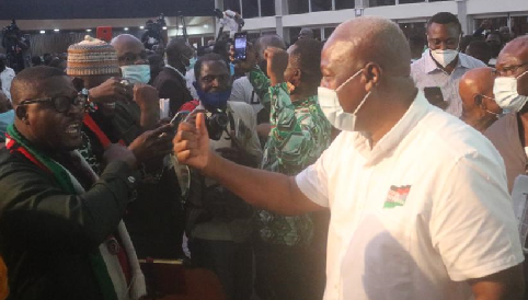 Former President Mahama interacting with some members of the NDC