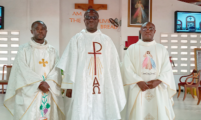 Priest-in-charge of Divine Mercy Catholic Church, Rev. Fr Francis Destiny Amenuvor (middle), Rev. Fr Clement Akwasi Adjei (right) and Rev. Fr Raphael Frimpong (left) after celebration of Mass  