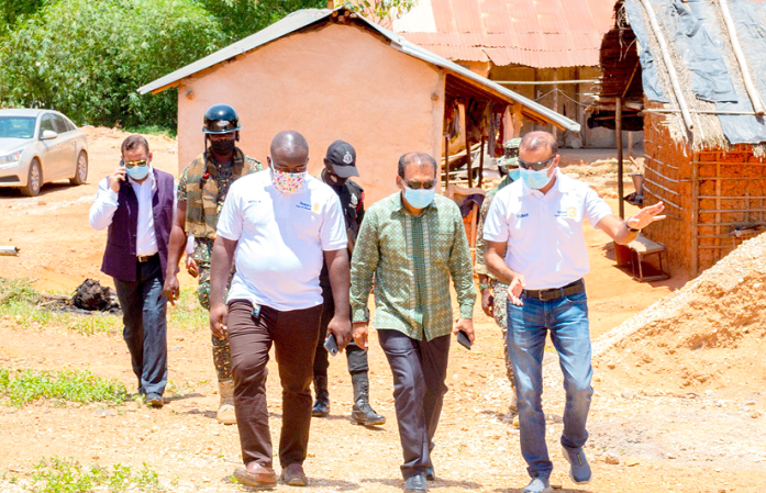 Mr Sugandh Rajaram (middle), the Indian high commissioner, with some members of the club touring the project sites