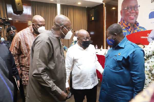 President Akufo-Addo interacting with Mr Eric Nana Agyeman-Prempeh (right), the Director-General of NADMO. With them is Mr Ambrose Dery (left), the Interior Minister. Picture: SAMUEL TEI ADANO