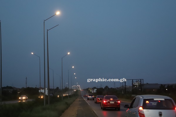 Street lights along the Accra-Tema Motorway in the evening.