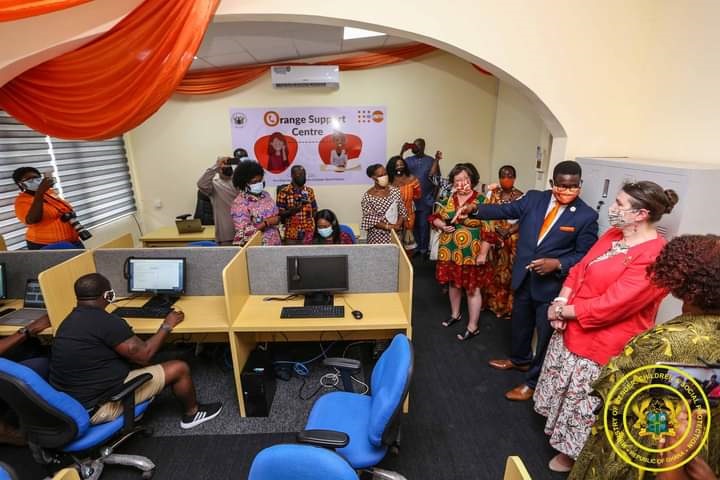 Mr Niyi Ojuolape (2nd right), UNFPA Country Representative, explaining the functions of the call centre to some dignitaries and participants when the centre was opened
