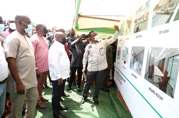 President  Akufo-Addo being briefed on the project by Mr Dereck Gabbrani (right), lead consultant for the project. Looking on is Mr Mustapha Ussif (left), the Minister of Youth and Sports. Picture: SAMUEL TEI ADANO