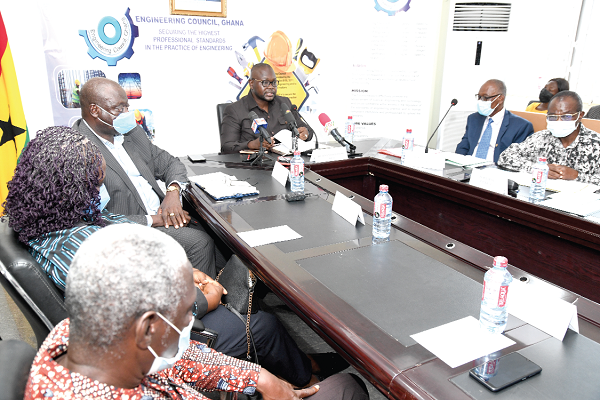 Mr Francis Asenso-Boakye (head of table) the Minister of Works and Housing,  addressing the Engineering Council press conference. Picture: EBOW HANSON