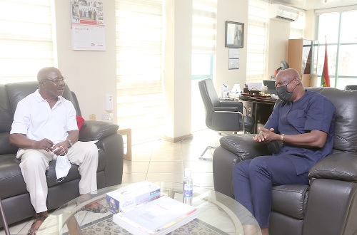 Mr Kwaw Ansah, Renowned Filmmaker during the call on Mr Ato Afful, Managing Director of the Graphic Communications Group Ltd. 