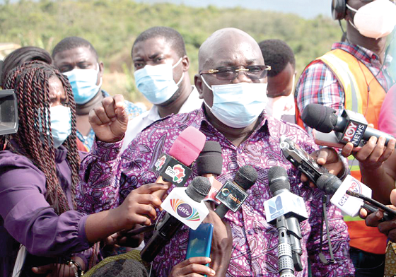 Mr  John Jabbah Bennam (middle), Vice Chairman, Committee on Works and Housing, briefing journalists