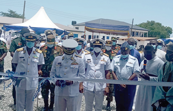 ABOVE: Vice Admiral Seth Amoama (middle), the Chief of the Defence Staff, being assisted by Commodore Samuel Walker (left), Flag Officer Commanding the Western Naval Command, to inaugurate the quarters (below)