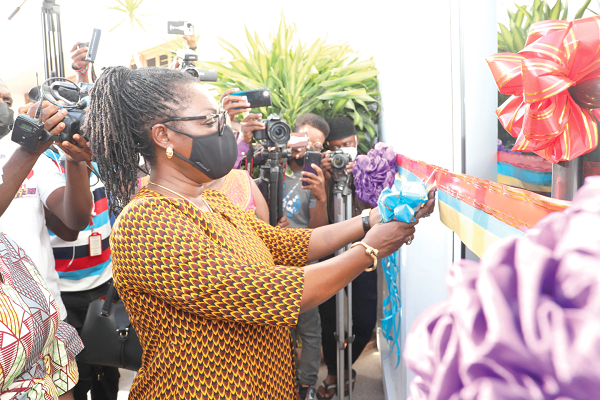 Mrs Ursula Owusu-Ekuful, the Minister of Communications and Digitisation, inaugurating the new office building for digital transmission in Accra. INSET: The new office for digital transmission. Picture: GABRIEL AHIABOR