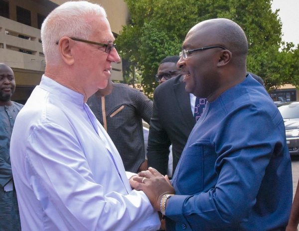 Rev Father Andrew Campbell, Parish Priest of Christ the King Catholic Church in a tete a tete with Vice President Dr. Mahamudu Bawumia 