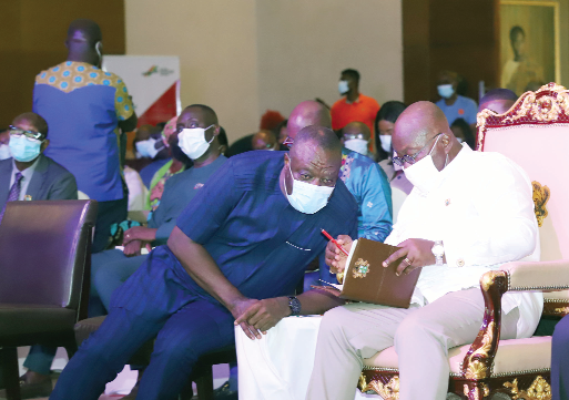 President Akufo-Addo interacting with Dr Mohammed Awal (left), the Minister of Tourism, Arts and Culture, at the launch of the Presidential Pitch For Local Films. Picture: SAMUEL TEI ADANO