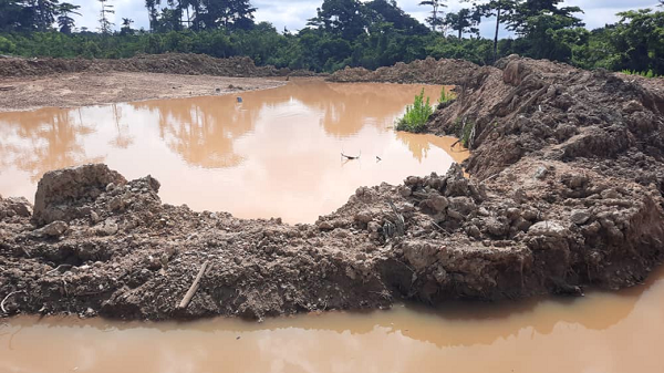 A degraded land; it shows the activities of the illegal miners