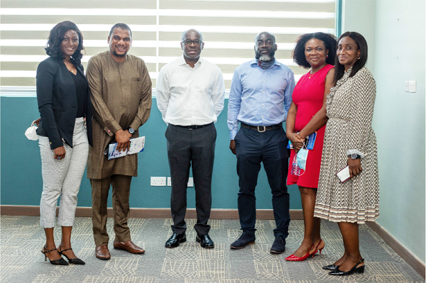 From left: Dr Harriet Aloribasua Kanlisi, a medical officer; Mr Farihan Alhassan, acting Head, Personal and Business Banking, Stanbic Bank; Mr Kwamina Asomaning, Chief Executive of Stanbic Bank; Mr Moses Clocuh, Chief Operating Officer, AMC, with Ms Sena Kudjawu, Legal Counsel, AMC; and Dr Cynthia Opoku-Akoto, CEO, AMC