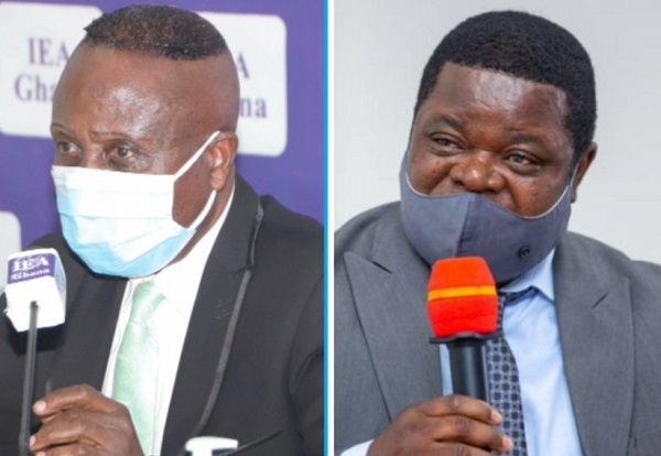Dr John K. Kwakye, Director of Research, IEA, speaking at the media briefing || Prof Peter Quartey, Director, Institute of Statistical, Social and Economic Research, reviewing the 2021 Mid-Year Budget Review.