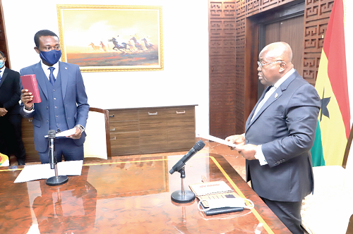 President Nana Addo Dankwa Akufo-Addo swearing in Mr Kissi Agyebeng as Special Prosecutor at a ceremony in Accra. Picture: SAMUEL  TEI ADANO
