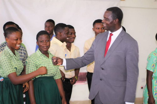 The Minister of Education, Dr Yaw Osei Adutwum interacting with some students