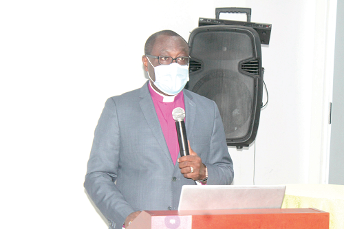 Rev. Dr Ernest Adu-Gyamfi , Chairperson, Governing Board of National Peace Council, addressing the participants