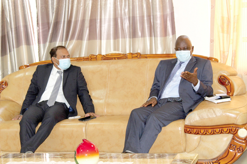 Mr Sugandh Rajaram (left), the Indian High Commissioner to Ghana, and Mr Stephen Yakubu, the Upper East Regional Minister, holding discussions