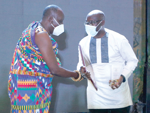 Nana Otuo Serebour II, presenting the Overall Bbest Award to Ing Godwin Brocke. Picture: NII MARTEY BOTCHWAY 