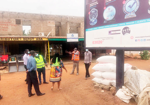 The team inspecting some of the billboards in the Ada East District 
