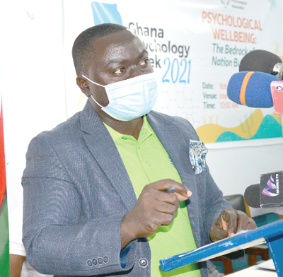 Dr Collins Badu Agyemang (left), President of the Ghana Psychological Association, giving a remark at the launch. Photo: ALBERTA MORTTY
