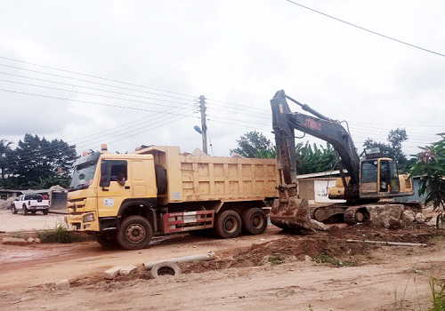Heavy machines at work on the Cape Coast Technical University road