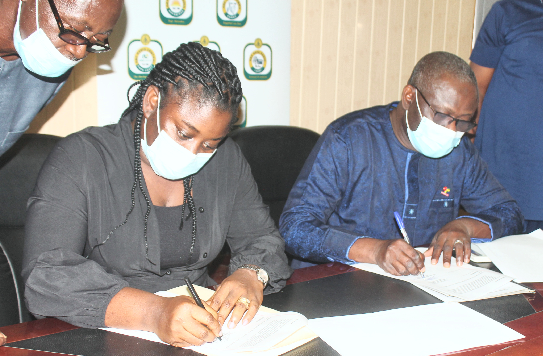 • Prof Amin Alhassan (right), Director-General, Ghana Broadcasting Corporation (GBC) and Madam Estelle Liberty Kemoh (left), Director-General, Liberian Broadcasting Systems (LBS), signing the memorandum of understanding. Picture: Maxwell Ocloo