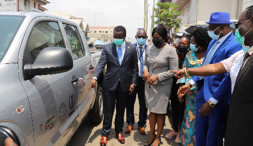 • Dr. John Ntim Fordjour (left), Deputy Minister of Education, pointing to an inscription on the pickup vehicle at a ceremony in Accra. Those with him include Professor Kwasi Opoku-Amankwa (2nd left), Director-General of GES, Mr. Christian Addai-Poku (2nd right), Registrar of the National Teachers Council, and Ms Akosua Boahen (3rd left), Head of Marketing and Corporate Affairs of the Prudential Bank. Picture: Gabriel Ahiabor