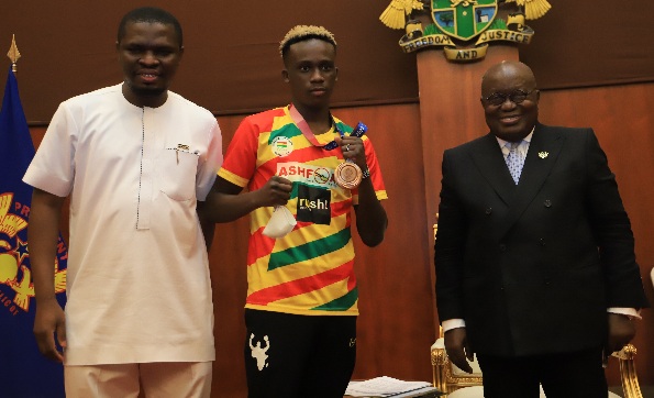 President Akufo-Addo (right) met Samuel Takyi (middle) at the Jubilee House