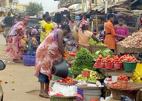 Market women going about their businesses without face masks