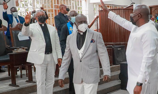 • Vice-President Dr. Mahamudu Bawumia (right) acknowledging cheers from the clergy