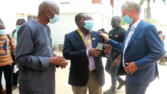 • Nico Roozen (right), Honorary President, Solidaridad Network, Mr. Isaac Kwadwo Gyamfi (middle), Regional Director, Solidaridad West Africa, and Mr. Ebrima Sall, Executive Director, Trust Africa, having some discussions after the meeting. Picture: Maxwell Ocloo