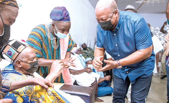  Mr Mahama (right) exchanging pleasantries with Wa Naa Pelpuo at the palace