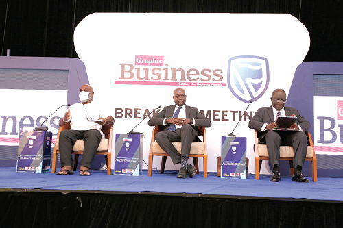 Prof. Kwame Karikari (left), Board Chairman of the Graphic Communications Group Ltd, speaking at the Graphic Business/Stanbic Bank breakfast meeting in Accra. With him are Mr Stephen N. Boadi (middle), the digital marketing and communication expert  and Mr George Twumasi, CEO of ABN Holdings. Picture: Nii Martey Botcway 