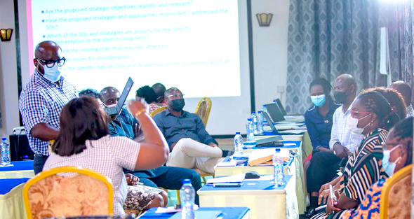 Some participants in the workshop sharing knowledge during a group discussion 