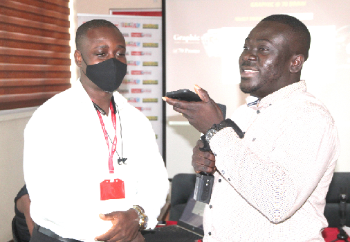 •Mr. Benjamin Tsatsu Korsinah (right) of the Graphic Communications Group Limited and Mr. Berko Kwabena Asante (left), Assistant Marketing Manager for Events, undertaking the draw. Picture: ESTHER ADJEI