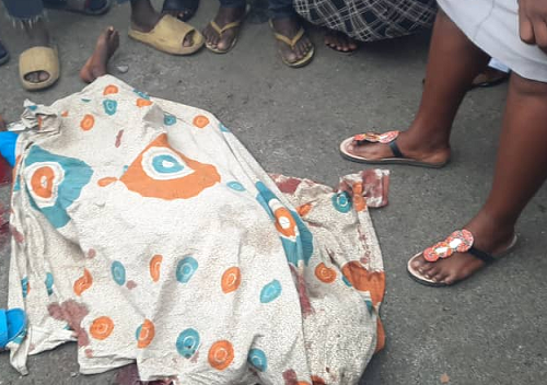 Body of the deceased covered with clothe
