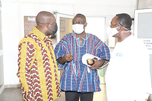 Dr Owusu Afriyie Akoto (right), the Minister of Food and Agriculture;  Mr Kojo Oppong Nkrumah (left), the Minister of Information and Mr Yaw Frimpong Addo, Deputy Minister of Food and Agriculture, interacting after the meet-the-press session in Accra. Picture: GABRIEL AHIABOR