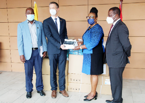 • Mr. Hans-Helge Sander (2nd left), Deputy Head of Mission, German Embassy, presenting some of the items to Ms. Tina Mensah, a Deputy Minister of Health, and Dr. Patrick Kuma-Aboagye (right), Director-General, GHS. Picture: ESTHER ADJEI