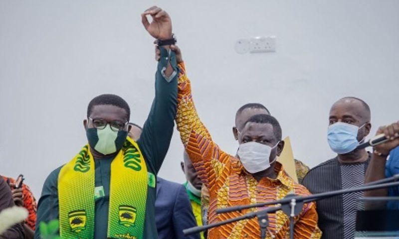 Flashback: Board chairman Dr Kwame Kyei (middle) raises the hand of Nana Yaw Amponsah when he was officially unveiled as CEO of Kumasi Asante Kotoko 