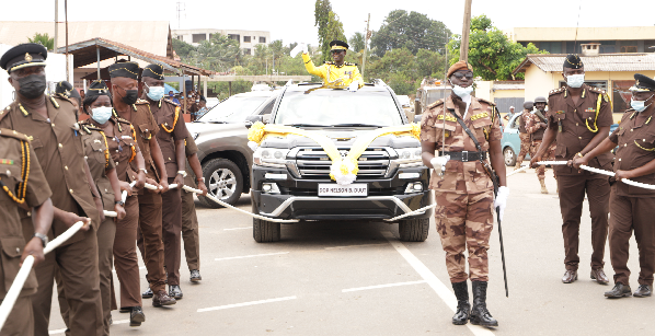 •Mr. Nelson B. Duut, Director of Prisons, Finance and Administration, acknowledging cheers from participants and family members during the pull out ceremony. Picture: EDNA SALVO-KOTEY