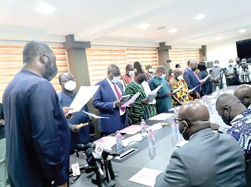Dr Matthew Opoku Prempeh (left) inaugurating the GNPC Board